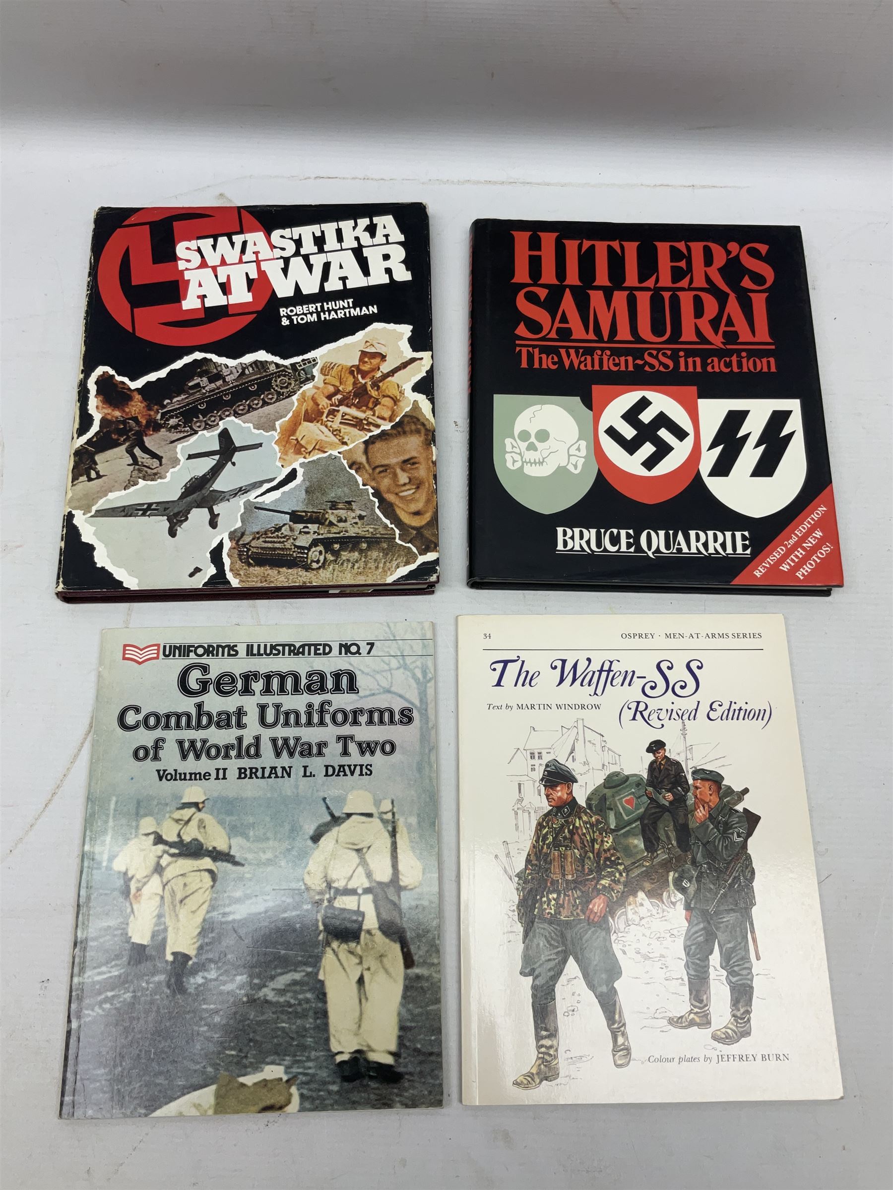Twenty-six books of WW2 German interest with particular emphasis on the 'SS', including Charles Sydnor: Soldiers of Destruction; G.S. Graber: History of the 'SS'; Bruce Quarrie: Hitler's Samurai; David Cesarini: Eichmann - His Life and Crimes; collector's reference books etc (26)
