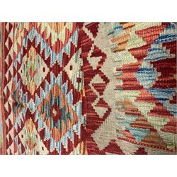 Choli Kilim red and beige ground rug, geometric patterned field