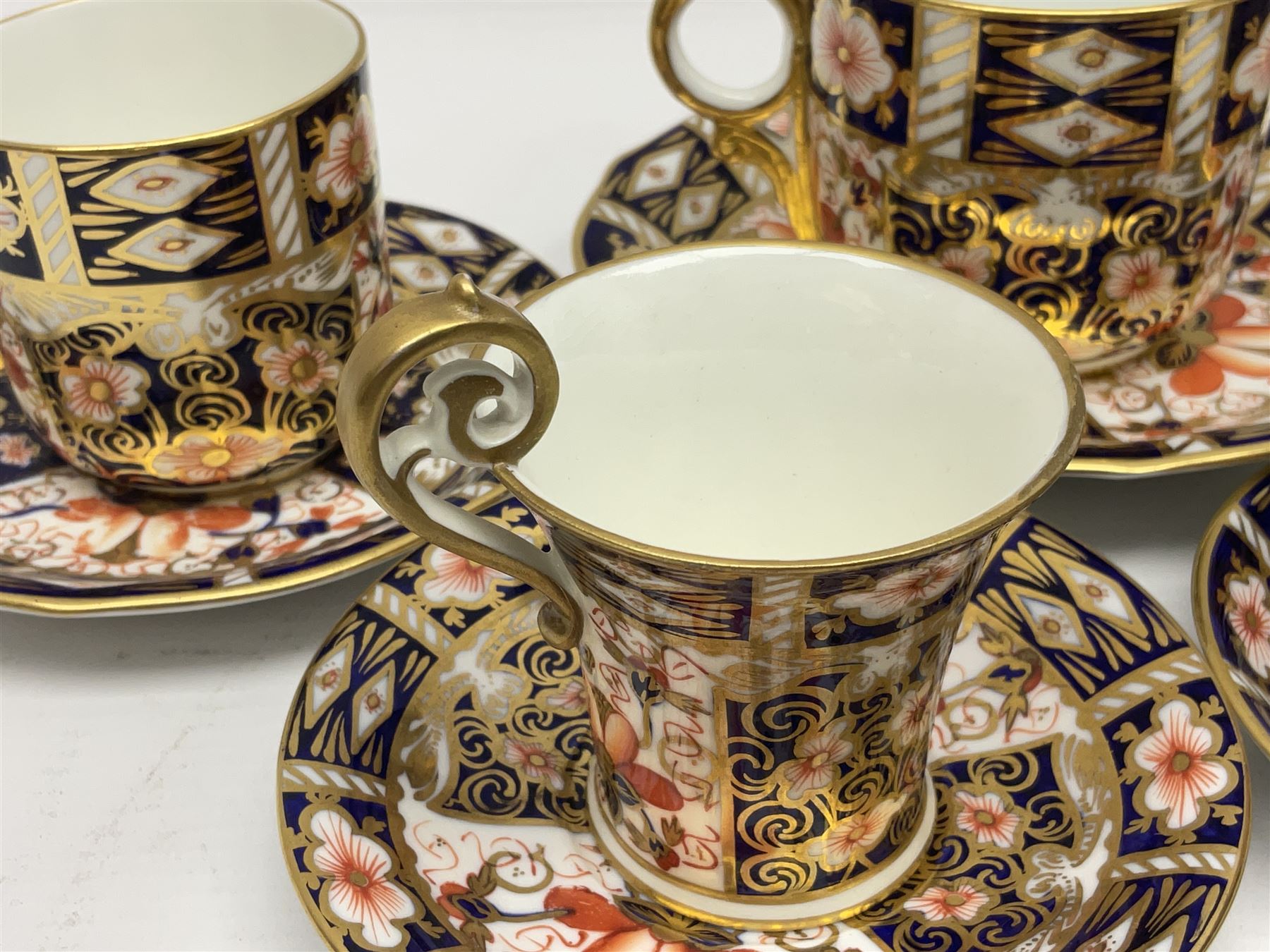 Six Royal Crown Derby cups and saucers all in imari pattern 2451, in various shapes  