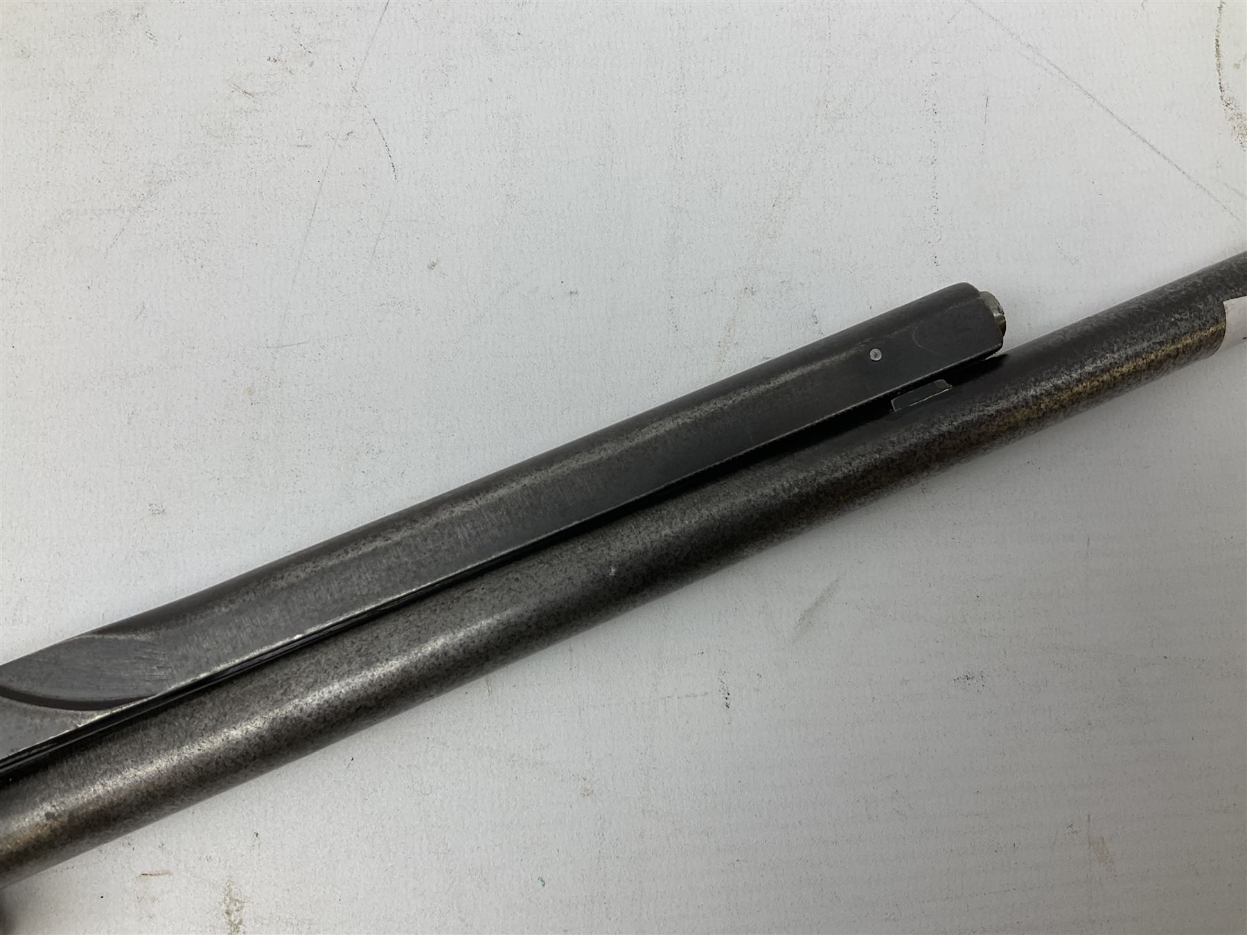 BSA .177 air rifle with top loading under lever action, walnut stock carved with chequered BSA logo to grip, serial no.A1203 L102cm