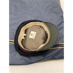 RAF Flight Lieutenant's uniform with peaked cap and WW2 ribbon bar; WW2 gas mask in blue canvas bag dated 1942; flying helmet date 1984; and British Army Major's uniform with Staybrite buttons and peaked cap