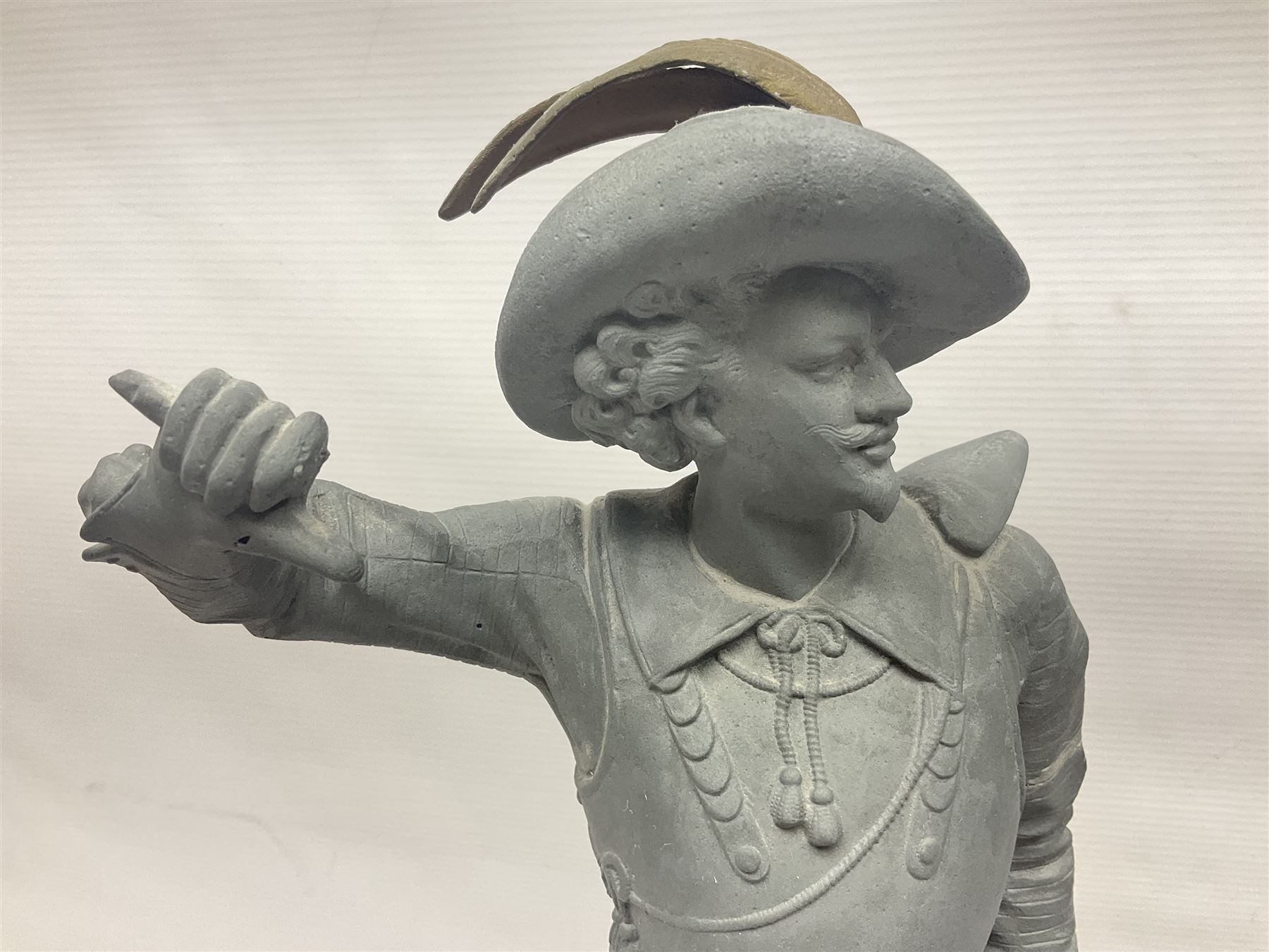 Pair of spelter figures modeled as Cavaliers, together with a spelter figure of Joan of Arc, largest H52cm