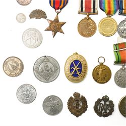World War I trio to 118150 Gnr H E Ashfield R.A. comprising War medal, Victory medal and George VI Special Constabulary medal,  WWII Burma Star, 1939-1945 Star and Defence medal, military badges, assorted coins etc