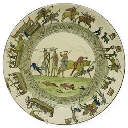 Royal Doulton series ware, comprising Dutch Ruysdael `Two Men Discussing A Letter' pitcher, H33.5cm, Bayeux Tapestry plate and jug, and various Coaching Days items including a biscuit barrel with silver plate cover 