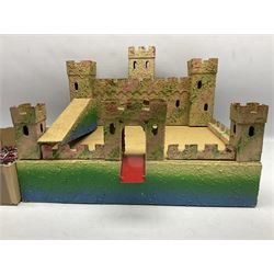Sectional wooden fort on base with painted textured finish 46 x 36cm; together with over thirty lead and die-cast white metal soldiers and horses by various makers; and a small quantity of plastic figures of soldiers