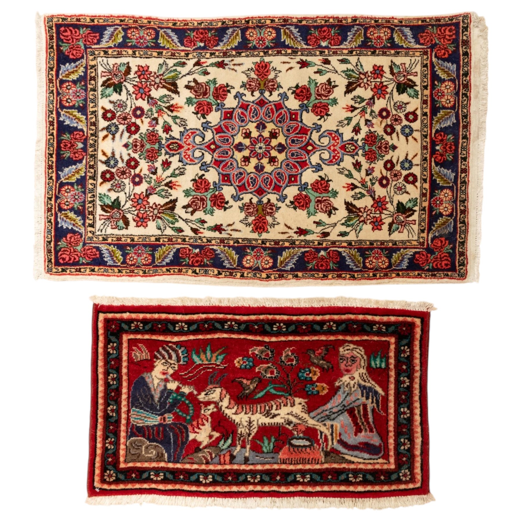 Two small rugs, an ivory ground example decorated with a central floral medallion and scattered rose sprays, enclosed by a navy foliate border (62cm x 101cm), and a crimson pictorial mat worked with seated figures, an animal and birds amongst flowering plants (45cm x 79cm) (2)