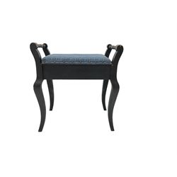Early to mid-20th century black finish piano stool, hinged seat lid enclosing compartment upholstered in blue fabric, cabriole supports
