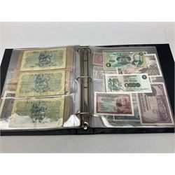 World banknotes, including Queen Elizabeth II The States of Jersey one pound 'DB202703', five pounds 'BB527762' and ten pounds 'AB651481', reserve bank of New Zealand two dollars '1L3 741894', King George V Straits Settlements one dollar 1st January 1935 'F/83 28924', various Bank of England notes etc, housed in two ring binder albums