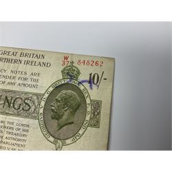 United Kingdom of Great Britain and Ireland Bradbury third issue ten shillings ‘B79 No. 027924’, Fisher second issue one pound ‘E1 92 No. 844345’ and two Fisher ten shillings banknotes 
