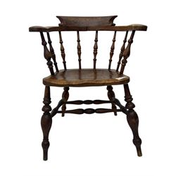 19th century elm and beech smoker's bow armchair, shaped arms over turned spindle gallery and dished seat, on turned supports united by double H-shaped swell turned stretchers 