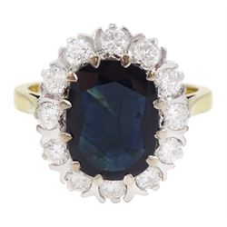18ct gold oval cut sapphire and round brilliant cut diamond cluster ring, London 1980, sapphire approx 2.50 carta, total diamond weight approx 0.70 carat
