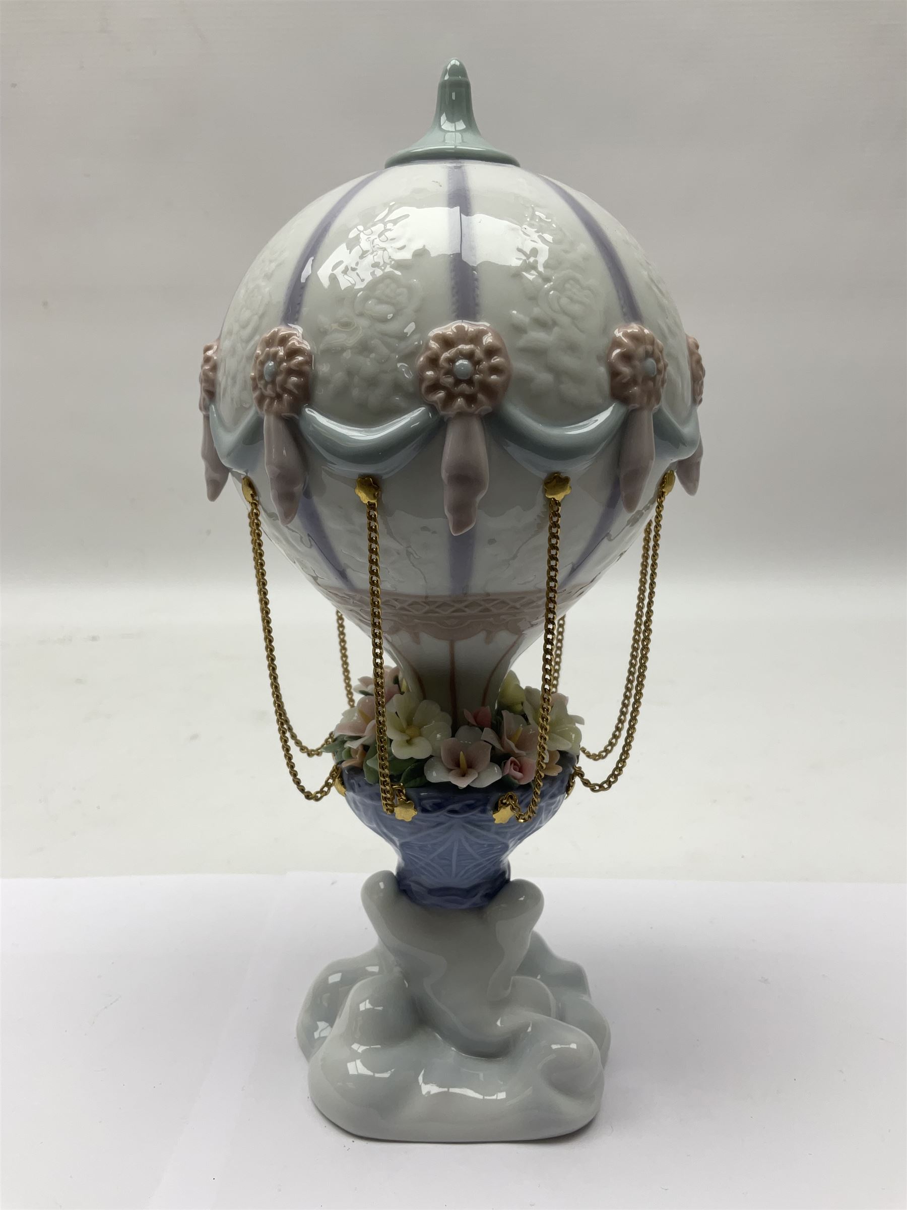 Lladro Flying High, modelled as a hot air balloon, with brass chains to suspended blossom filled basket, no 6523, with original box, H23cm