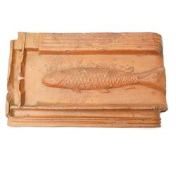 19th century French 'Tuile á la truite' terracotta roof tile, with embossed trout, W36cm