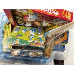 Large quantity of Mcdonalds toys in three boxes
