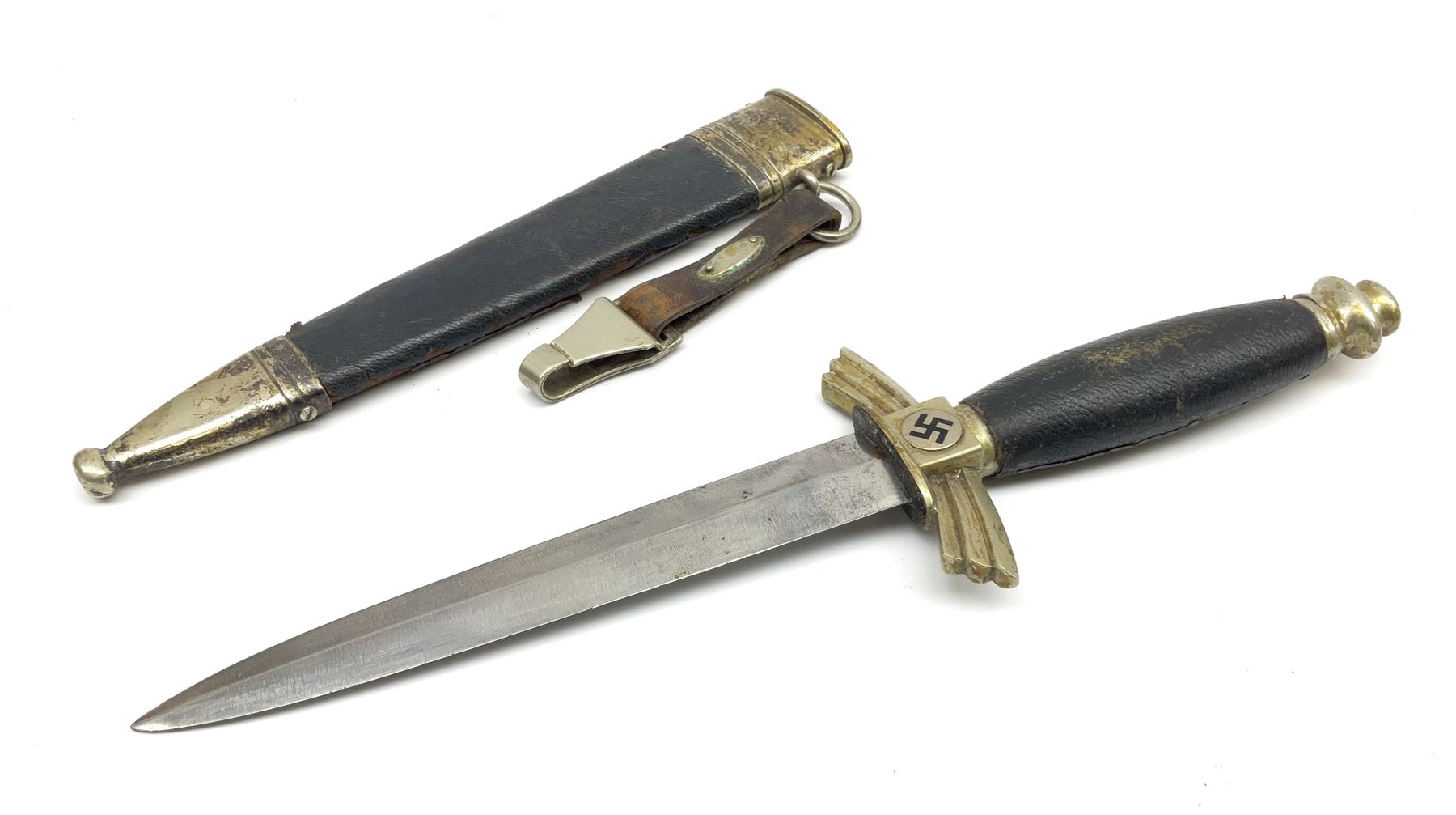  WW2 German SMF Solingen DLV flyers dagger with 16cm steel blade, nickel downswept cross-piece and pommel and leather covered grip, in leather and nickel scabbard with leather suspension strap L34cm overall. After WWI Germany was forbidden an air force by the Treaty of Versailles however the Deutscher Luftsport-Verband (German Air-sport Association) was formed in March 1933 from various sports flying clubs and had branches for aeroplane, gliding and balloon flying. Under cover of the sporting DLV, many future Luftwaffe pilots trained to fly. DLV was embodied with the NSKK in March 1935 and 1st March 1937 Luftwaffe formed.