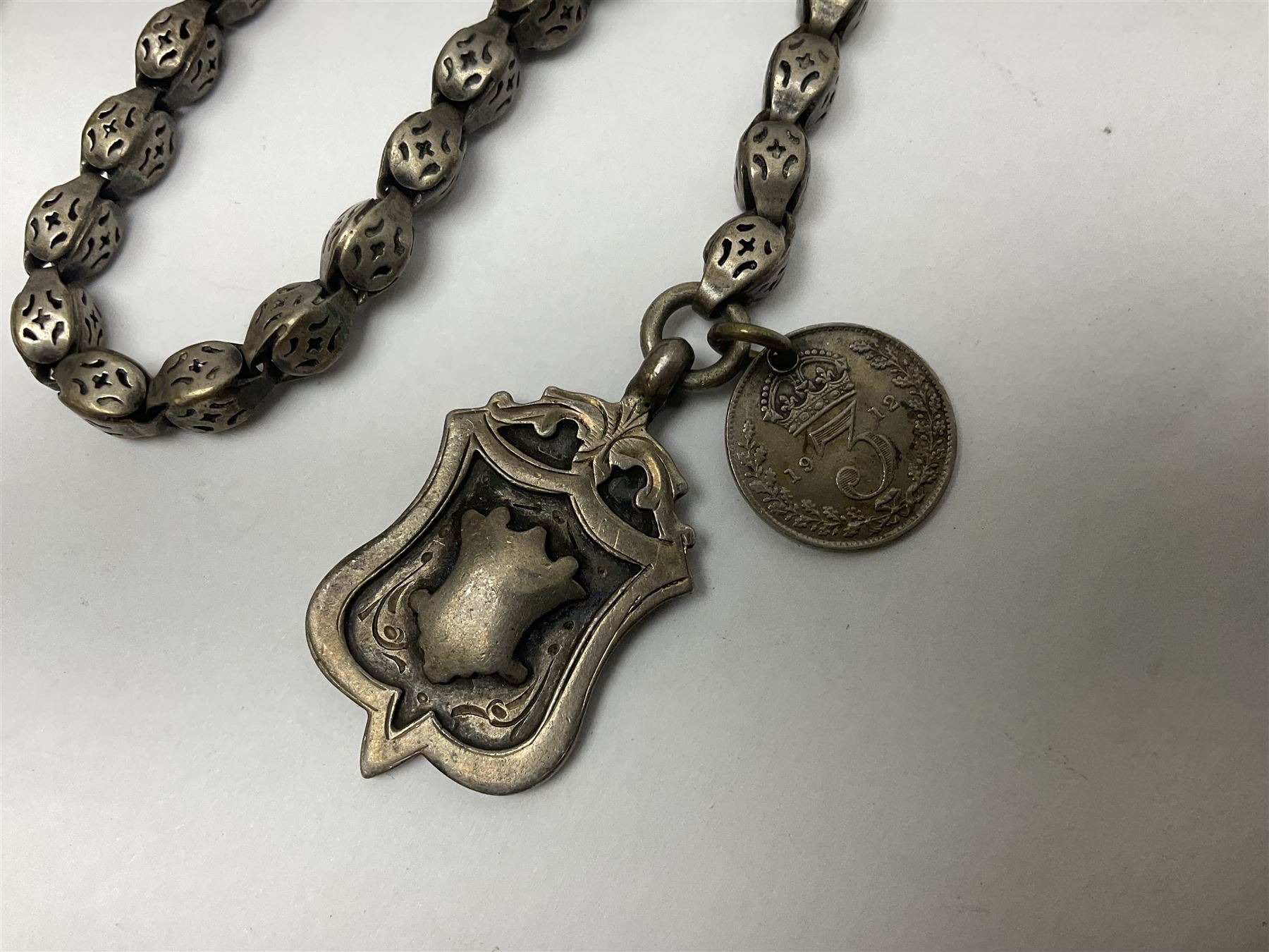 Victorian silver open face fusee lever pocket watch by D A Olswang, Sunderland, No. 7904, white enamel dial with Roman numerals and subsidiary seconds dial, case hallmarked Chester 1895 and a watch chain with silver fob and coin

 


