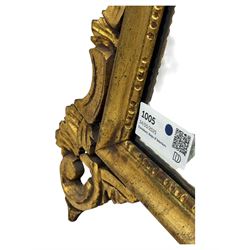 18th century design gilt framed wall mirror, within a pierced and scrolling foliate frame, leaf sprays and flowerhead cresting