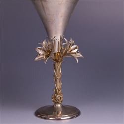 Modern limited edition silver goblet, 'made by order the provost and charter of Blackburn to commemorate the fiftieth anniversary of the cathedral in 1976 and its consecration in 1977' designed by Hector Miller for Aurum, the plain fluted cup, upon a stem of three lillies with parcel gilt highlihts and upon a circular foot, no. 2/750, hallmarked Hector Miller, London 1977, H17cm, boxed with certificate of authenticity