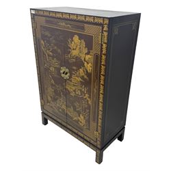 Chinese brown lacquered cocktail cabinet, decorated with gilt scenes of a traditional landscape with figures, pagodas, and mountainous scenery, double doors opening to reveal fitted interior with mirrored back, wine rack, shelves and cupboard, raised on square supports