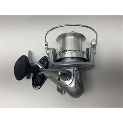 Four fixed spool reels, all in original boxes, comprising Shimano Ultegra 5500 XSD, with spare spool, Mitchell Autosurf 700, with spare spool, Shimano Sedona 600 FB with spare spool and D.A.M Quick 5001