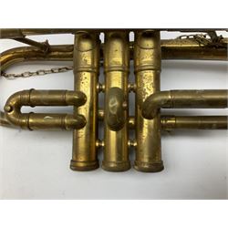 Two French horns together with a trumpet and xylophone