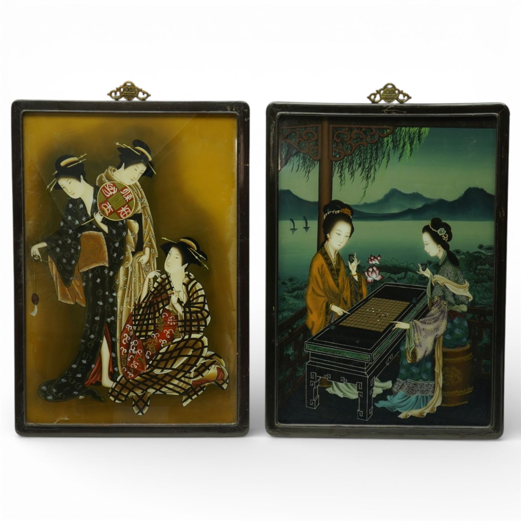 Pair of Chinese reverse glass paintings of three ladies in traditional dress and playing chess, Republic period, including frame 70cm x 49cm (2)