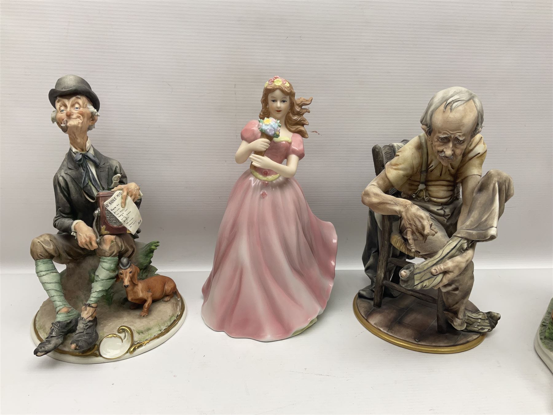 Two Capodimonte figures together with Melba Ware bull and other ceramics 