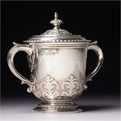 Silver two handled cup and cover with loop handles, raised stylised leaves and gadrooned edge H11cm London 1936 Maker Goldsmiths & Silversmiths Co. Ltd