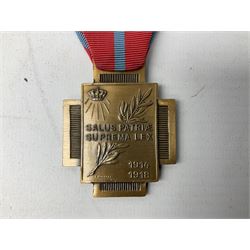 Five continental medals - WW1 Belgian Cross of Fire; WW1 French Croix De Guerre; French Croix De Combattant; French Republic Workers silver merit awarded to L. Mounet 1950; and boxed French Palmes Universitaires Officier d'Academie silver and enamel wreath (5)