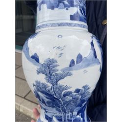 Qing Dynasty Yen Yen blue and white vase in the Kangxi style decorated with a lake landscape surrounded by rocky cliffs, figures in a boat and on the shore H45cm 