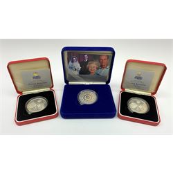 Two United Kingdom 1997 'Golden Wedding Anniversary' silver proof five pound coins and a  2007 'Diamond Wedding' silver proof five pound coin, all cased with certificates, no outer sleeves