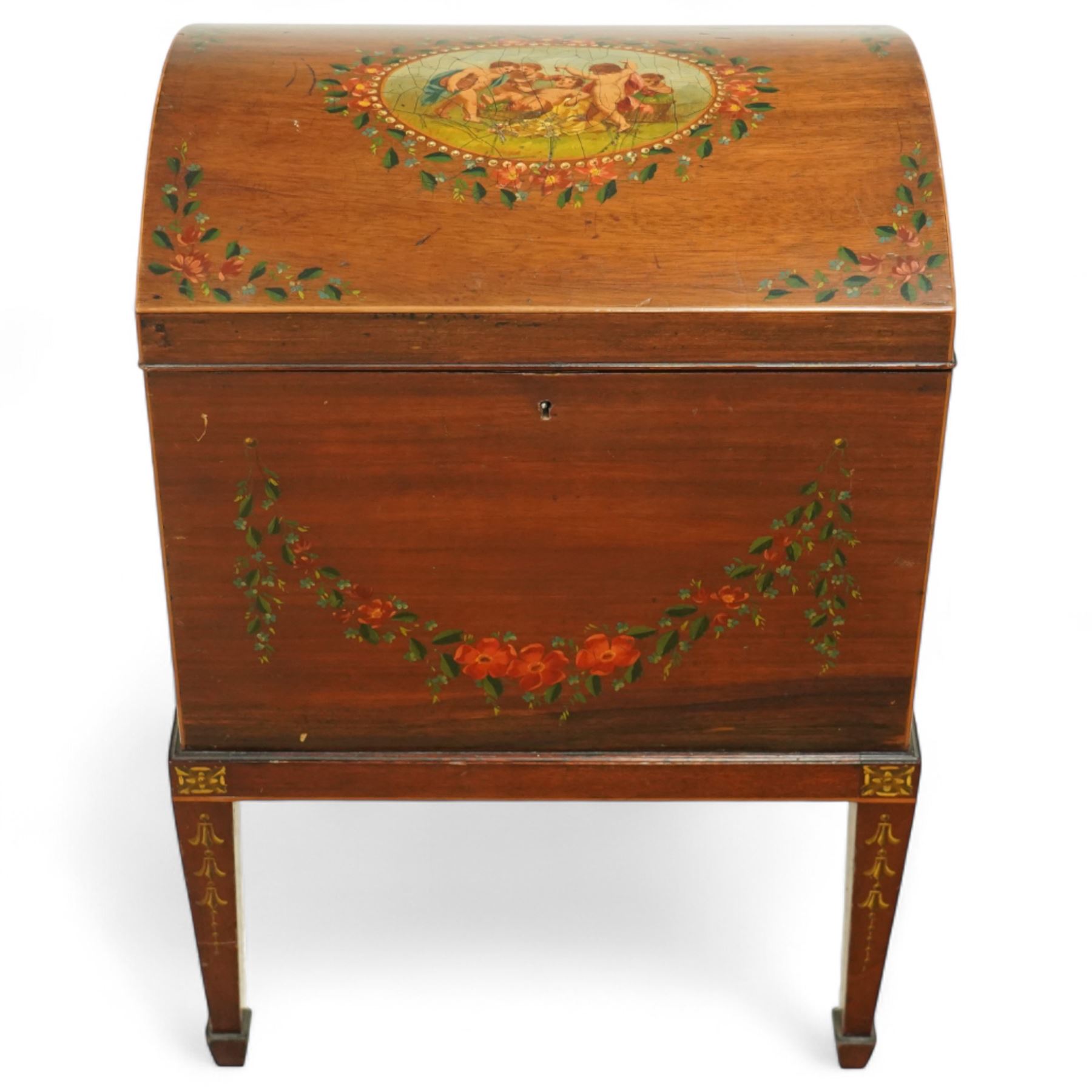 Edwardian painted mahogany and satinwood music cabinet, of rectangular form with domed hinged lid, the front and top decorated with hand-painted floral garlands and a central neoclassical panel depicting cherubs, raised on square tapering legs with gilt highlights