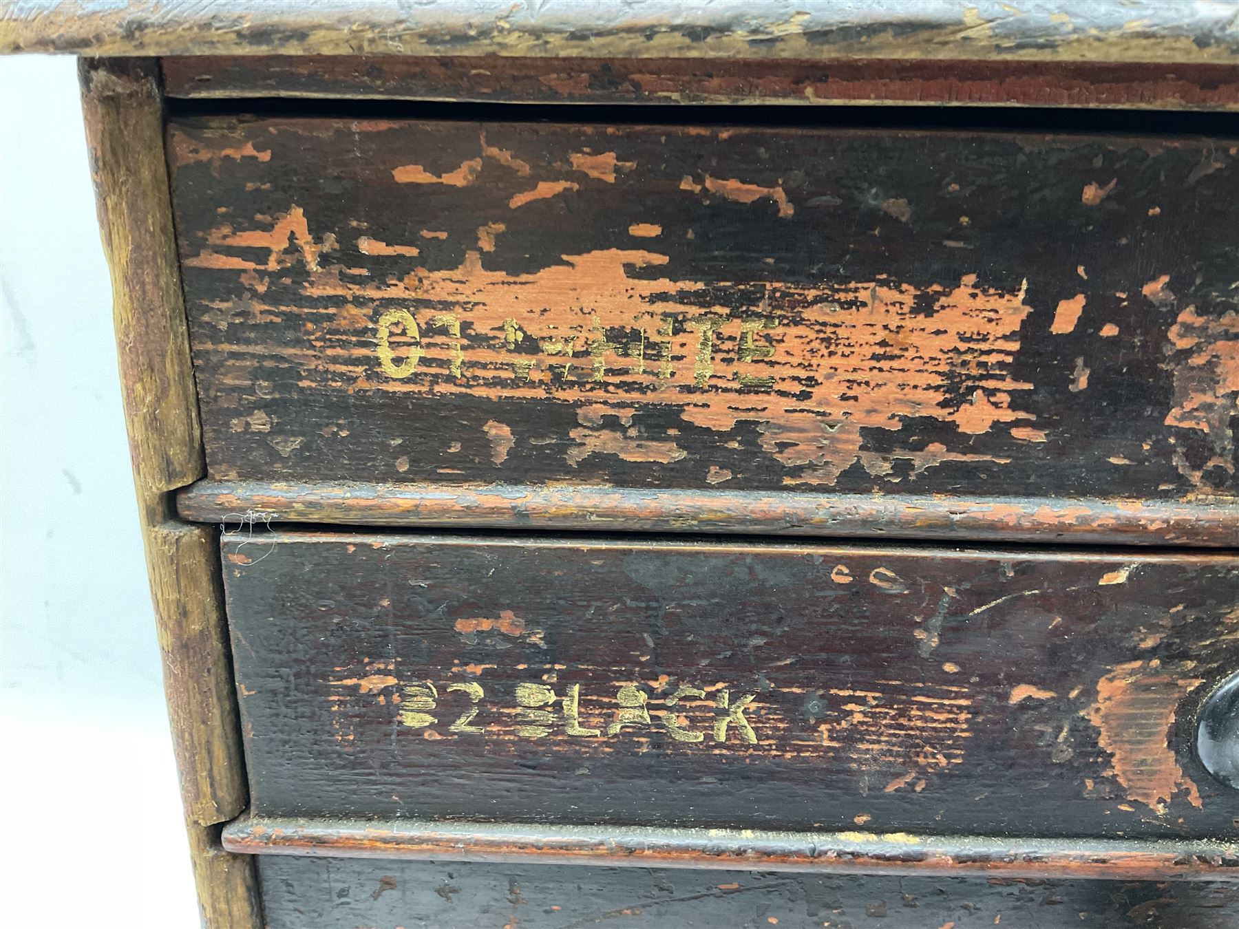 Early 20th Century Dewhurst table top chest, decorated with gilded 'Dewhurst's Sylko Machine Twist Strong Lustrous' lettering above six long drawers with names and numbers of cotton also detailed in gilt, H39cm