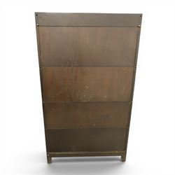 Harris Lebus - oak barrister stacking bookcase, four tier design with glazed fronts with brass knobs, raised on claw and ball feet