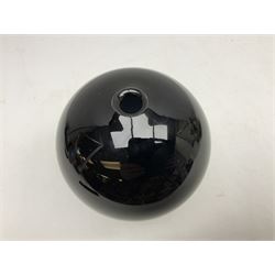 Gillies Jones of Rosedale; art glass specimen vase, shaped as a black ball upon a short clear tapering foot, with engraved marks beneath, H16cm