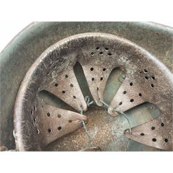 WWII Italian steel helmet with liner and chin strap
