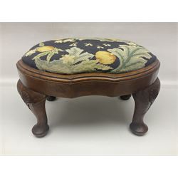 Victorian needlework footstools, decorated with bees amongst peach trees with carved legs with shell decoration and two other needlework footstools, largest H24cm 