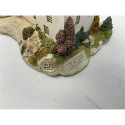 Two limited edition Lilliput Lane cottages, comprising Oakwood Smithy and Blair Athol, both boxed with deeds