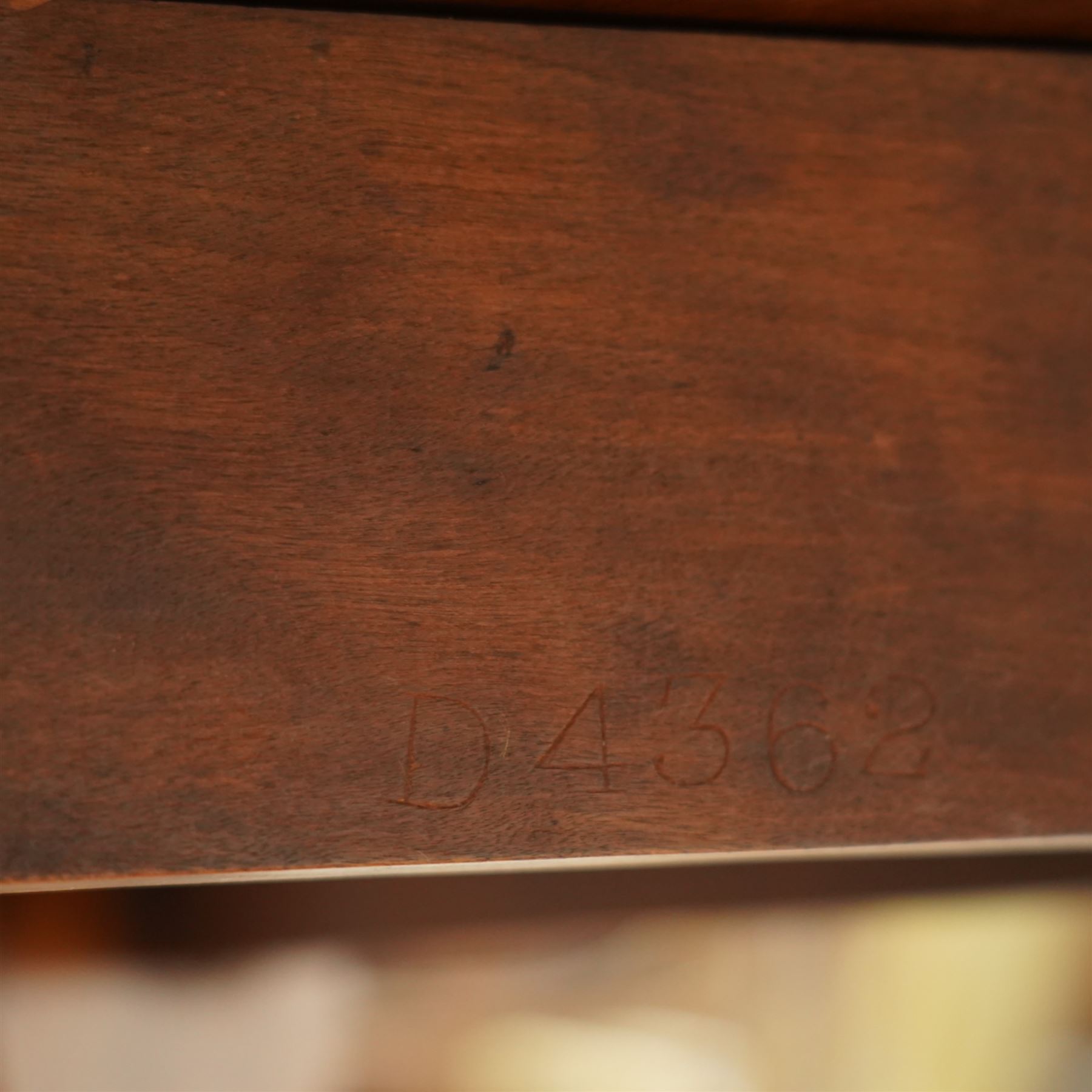 John Taylor & Son, Edinburgh - Late Victorian Aesthetic style walnut Sutherland table, with a hinged oval top on fret carved support, stamped John Taylor & Son Edinburgh, supported by scrolled feet on ceramic castor (Extended 105cm)
