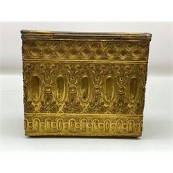 19th century brass repoussé perfume box, the ornately decorated casket with hinged domed cover lifting to reveal gold velvet lined interior containing three glass scent bottles, H14cm W15cm D7cm