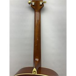 Woodstock model no.WHW41J203 acoustic guitar with mahogany back and sides and spruce top, serial no.2835 L102.5cm; in soft carrying case