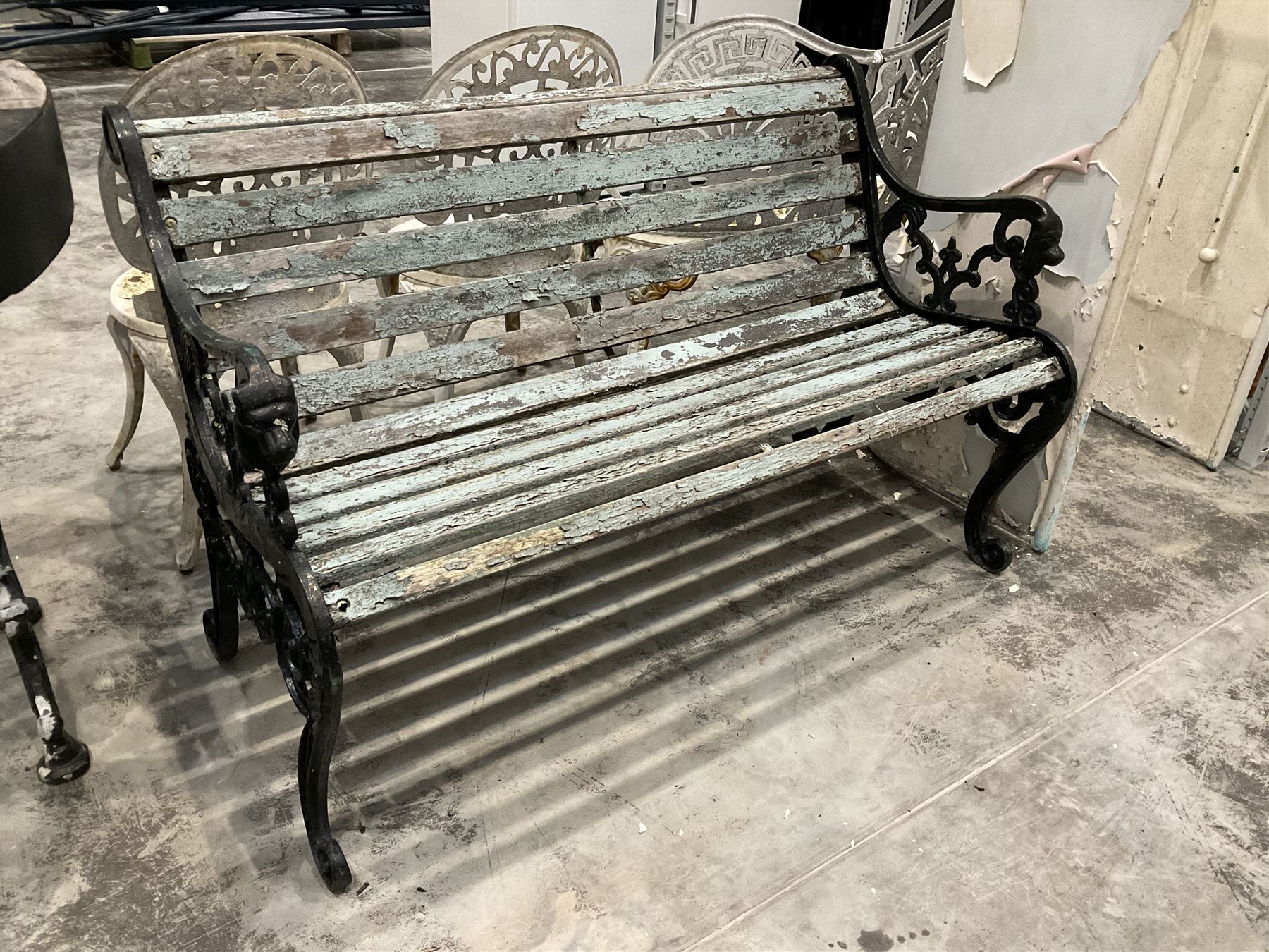 Black painted cast iron and wood slatted garden bench  - THIS LOT IS TO BE COLLECTED BY APPOINTMENT FROM DUGGLEBY STORAGE, GREAT HILL, EASTFIELD, SCARBOROUGH, YO11 3TX