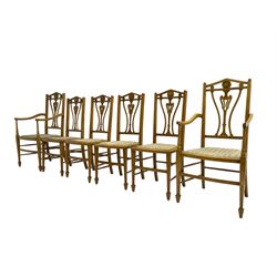 Set six (4+2) Edwardian satinwood dining chairs, triangular cresting rail painted with laurel wreath, shaped and pierced splat flanked by two shaped upright rails, with boxwood stringing, upholstered seats, on square tapering front supports with spade feet