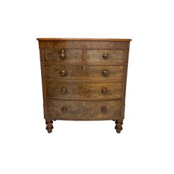 Late 19th century mahogany bow-front chest, fitted with two short drawers over three long drawers each with cockbeaded fronts, raised on turned feet