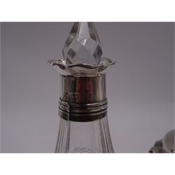 Late 18th century silver cruet stand, of oval form, with pierced sides upon four bun feet, hallmarked to handle Hester Bateman, all other hallmarks indistinct, together with five matched silver mounted cut glass cruet bottles, including some later Victorian examples, hallmarks predominantly indistinct, stand H20cm