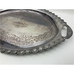 Oval silver plate twin handled tray, egg and dart edge, engraved with floral springs surrounding an central inscription, L65cm