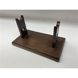 Early 19th century flintlock 16-bore overcoat/duelling pistol by William Bond Lombard Street London, the 23cm octagonal brown stub twist damascus barrel with small foresight, two barrel pins and ram rod under, inscribed Lombard Street London to the top and W. Bond to the action, full walnut stock with lightly engraved steel furniture, pineapple finial and escutcheon, half cock facility L39cm; loose mounted on later mahogany display stand with trade label