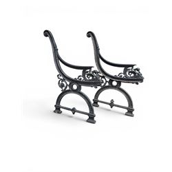 Yates Haywood - pair of 19th century cast iron bench ends, winged griffin detail, arched legs with rope turned decoration, finish in green paint, registration number 206550, first registered 8 March 1867 (see illustration), length as required