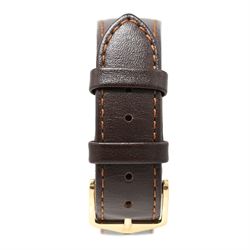 Garrard gentleman's 9ct gold manual wind wristwatch, silvered dial with Arabic hour markers and subsidiary seconds dial, the back case with personalised engraving, London 1974, on brown leather strap
