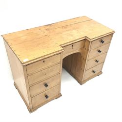 19th century breakfront pine desk, eight graduating drawers 